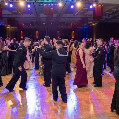 Couples dancing at a military ball